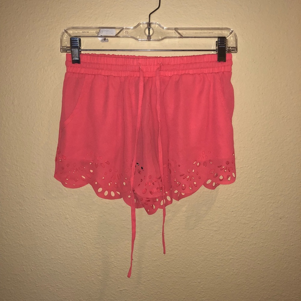 Pink shorts with cut outs NWT